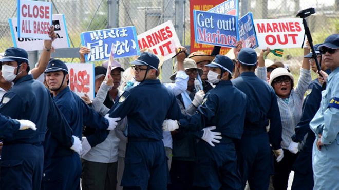 Japan's southern island of Okinawa rally against US base