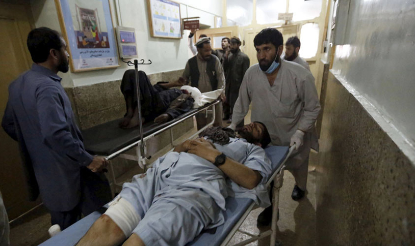 Afghanistan police bus attack kills 27, injures 40