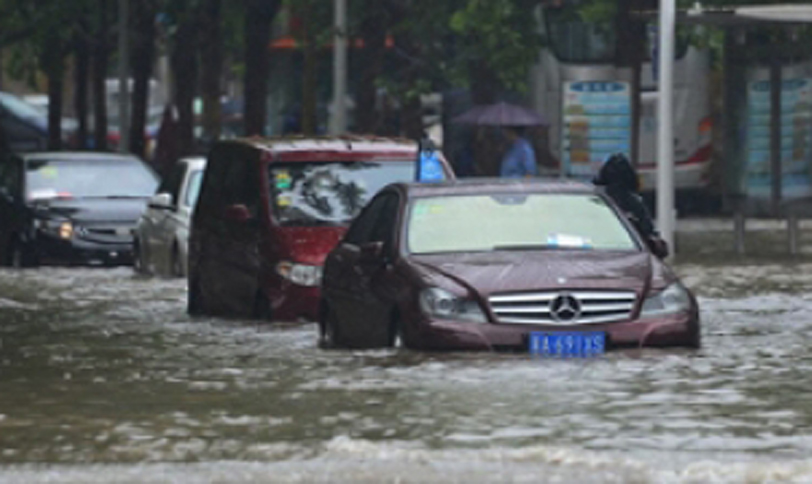 100 missing after heavy rains in China