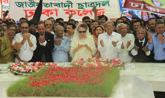 Khaleda respects on Zia's grave