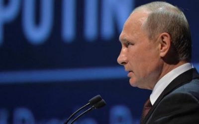 Putin postpones visit to France