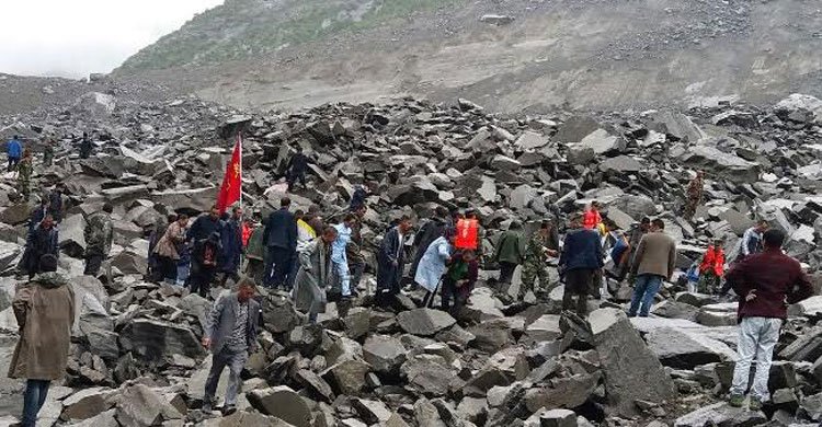 24 dead in China landslide, hundreds missing