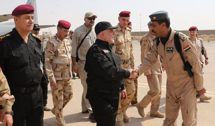 Iraqi Prime Minister in Mosul celebrates victory over IS